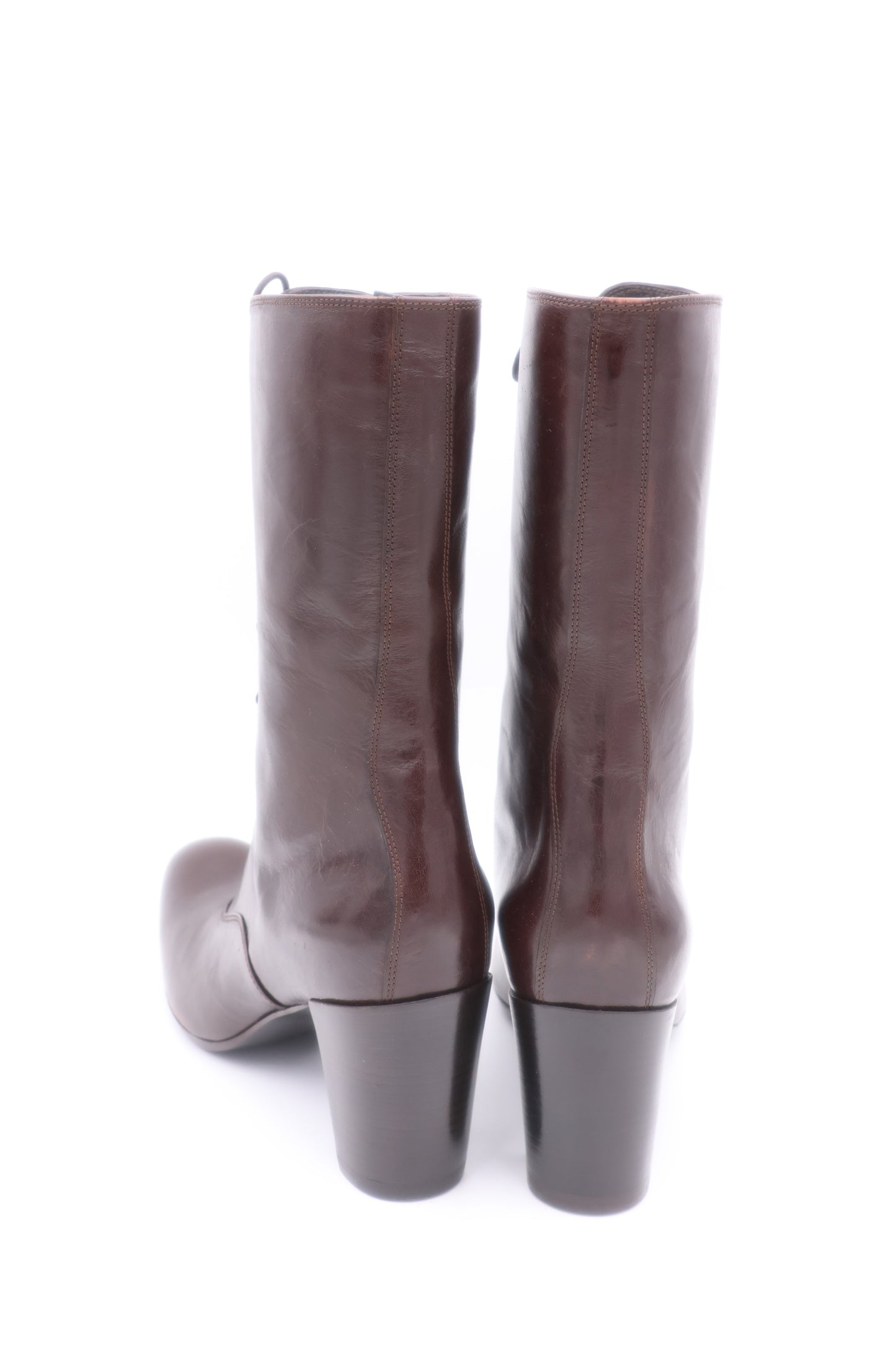 Pair of brown knee-high boots on a white background