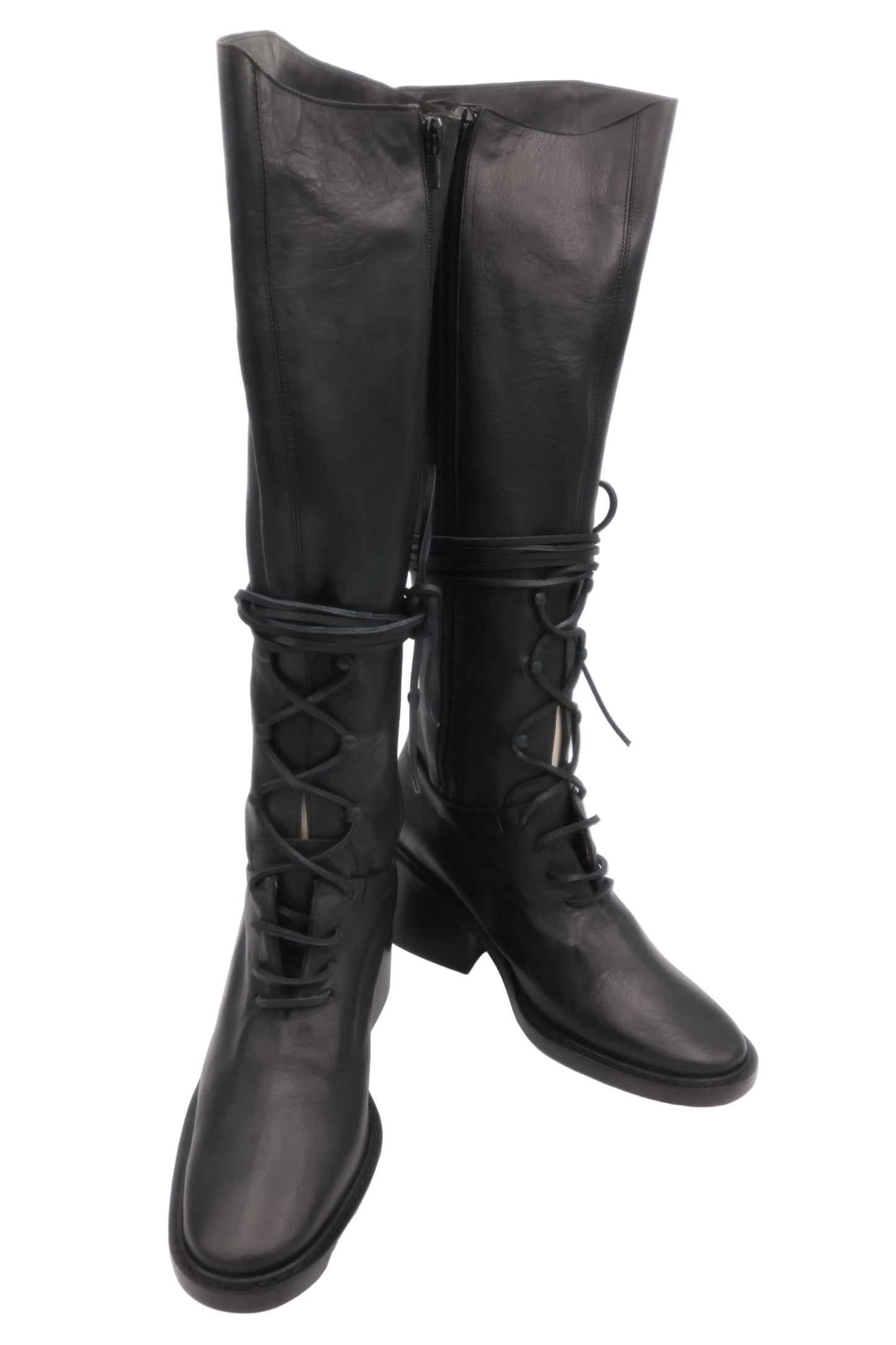 Black knee-high boots with lace-up design on a white background