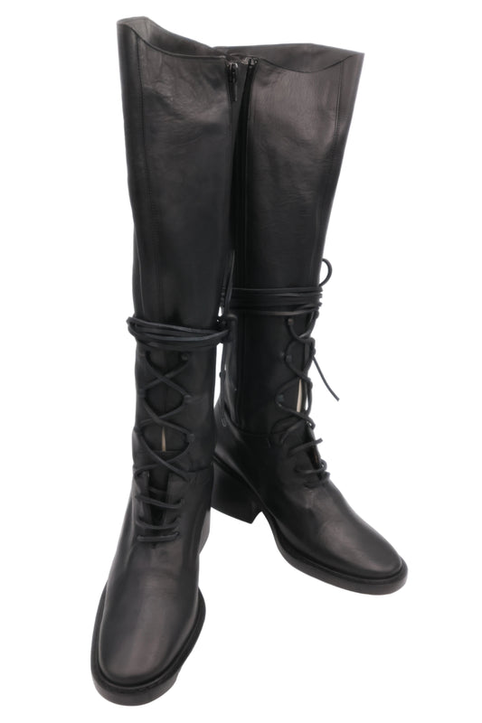 Black knee-high boots with lace-up design on a white background